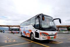 服務(wù)文旅專線！中車純電公交車駛?cè)朐颇蠈毑匦〕? onerror=